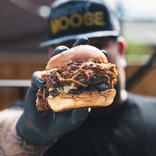 hangry-moose_-holding-burger